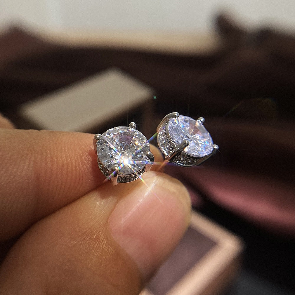 Boucle d'oreille unisexe en argent et zircone, point de lumière