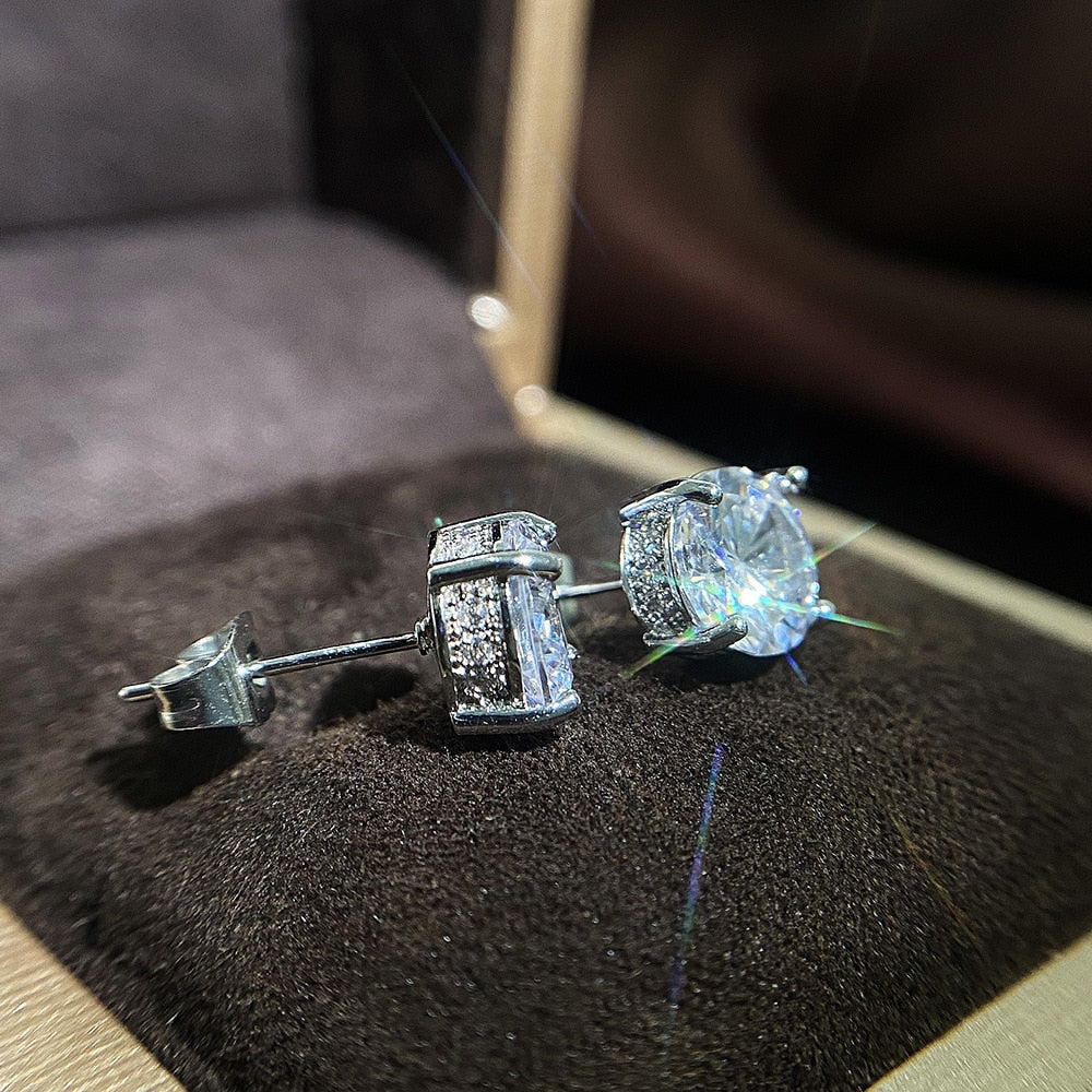 Boucle d'oreille unisexe en argent et zircone, point de lumière